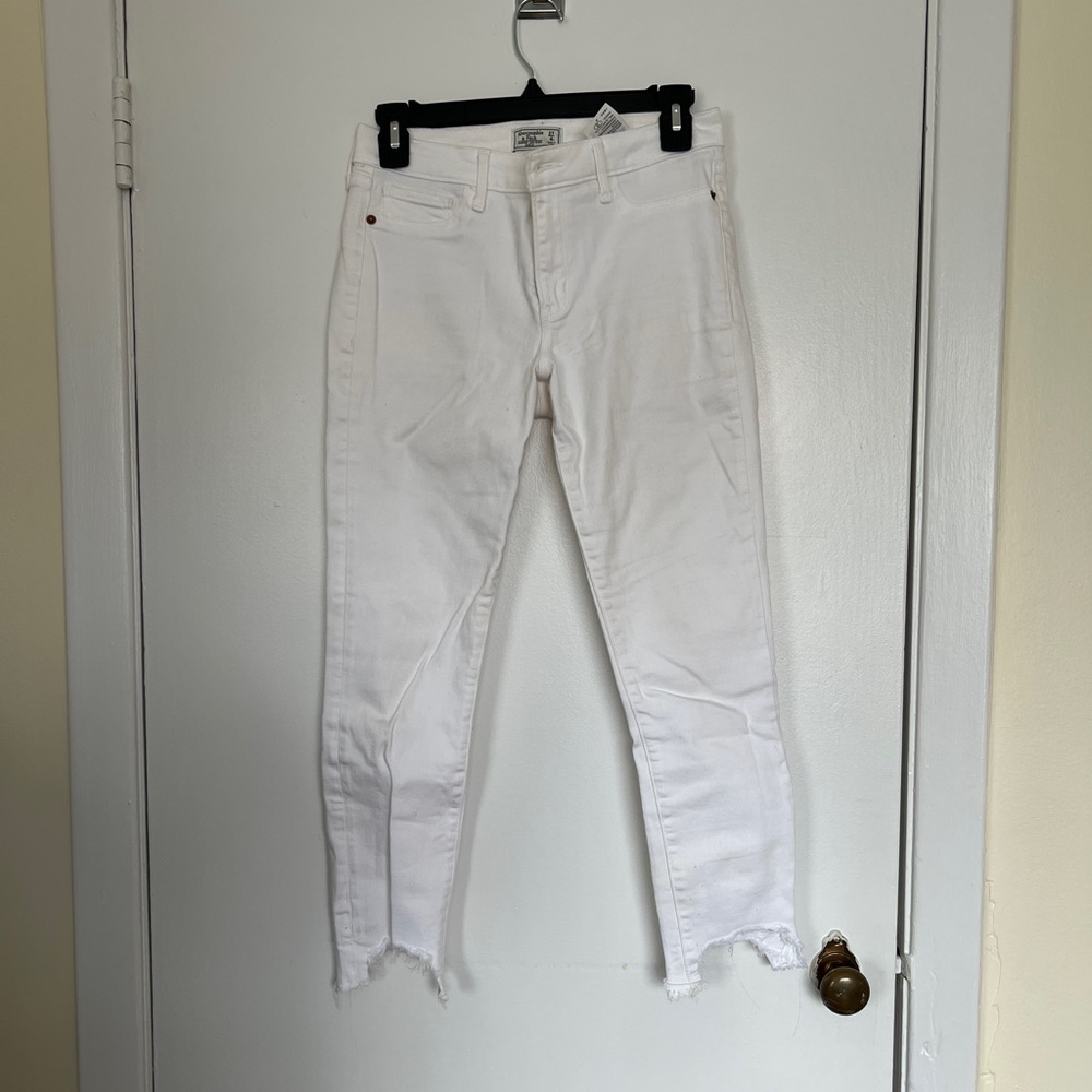Ankle length white skinny jeans